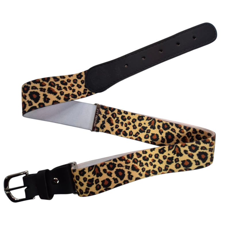 Stretch belts leopard. Designed for comfort and flexibility, often incorporating elastic materials in its construction to allow for movement and a comfortable fit. The specific belt has a fabric strap, and it features a traditional buckle closure